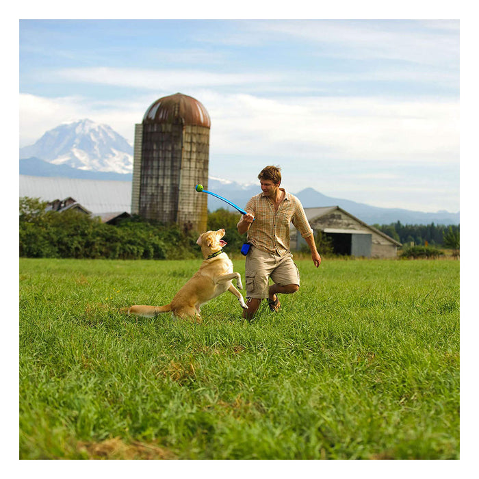 Person and dog playing with Classic Ball Launche.