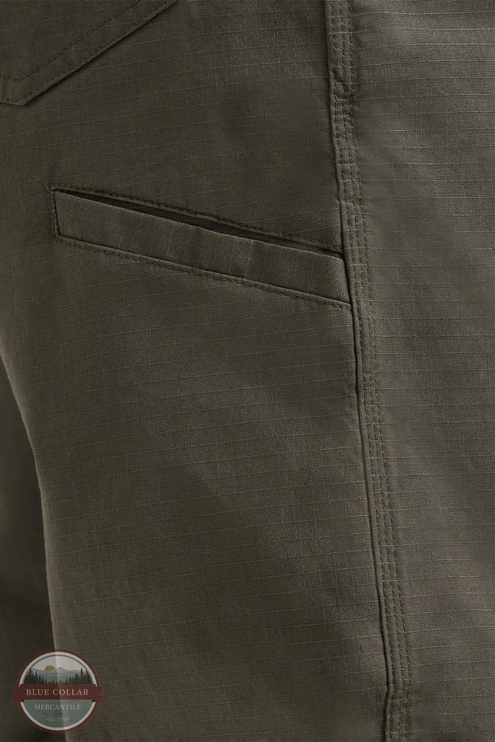 Wrangler 112375001 Riggs Workwear Performance Technician Pant in Loden Green phone pocket detail view
