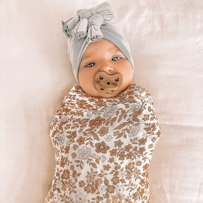 MWRAP25-BroderieSwaddle-LikedByLeo-4-square.jpg