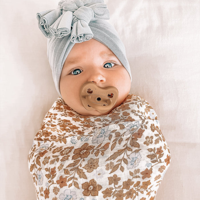 MWRAP25-BroderieSwaddle-LikedByLeo-1-square.jpg