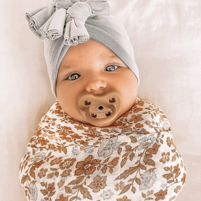 MWRAP25-BroderieSwaddle-LikedByLeo-3-square.jpg