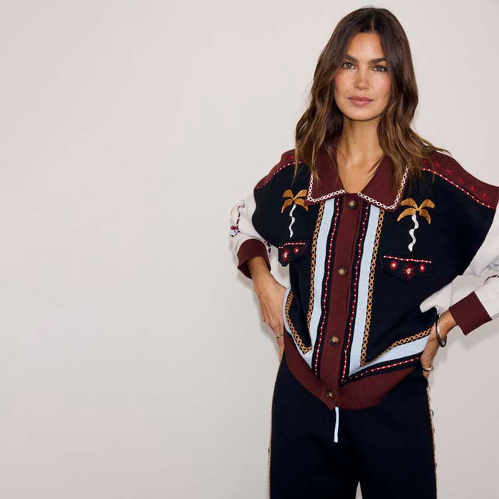 Geometric Knit Cardigan in autumnal tones with palm motif embroidery and blanket stitch trim, paired with joggers.