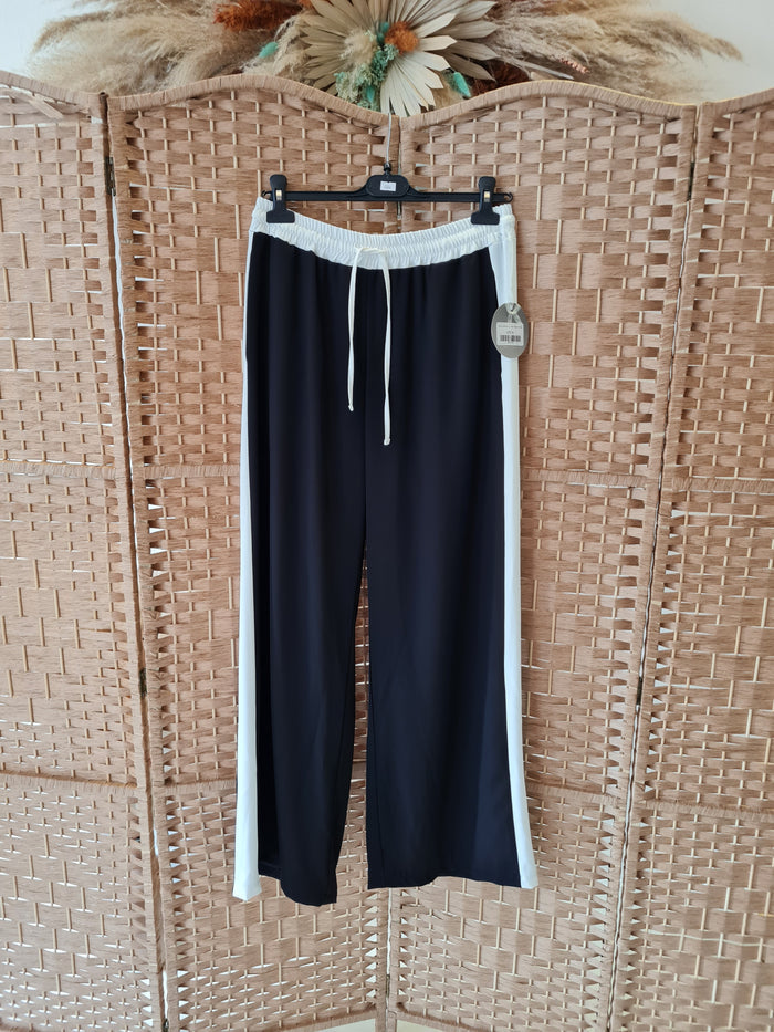 Hax Lux side stripe trousers in black & white L