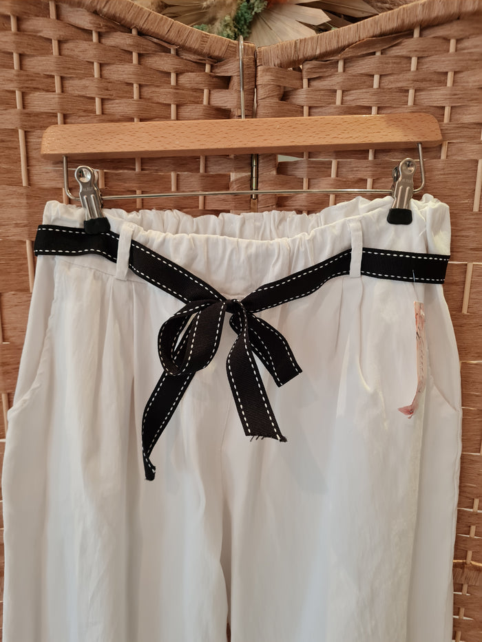 Paper bag stretchy trousers in white