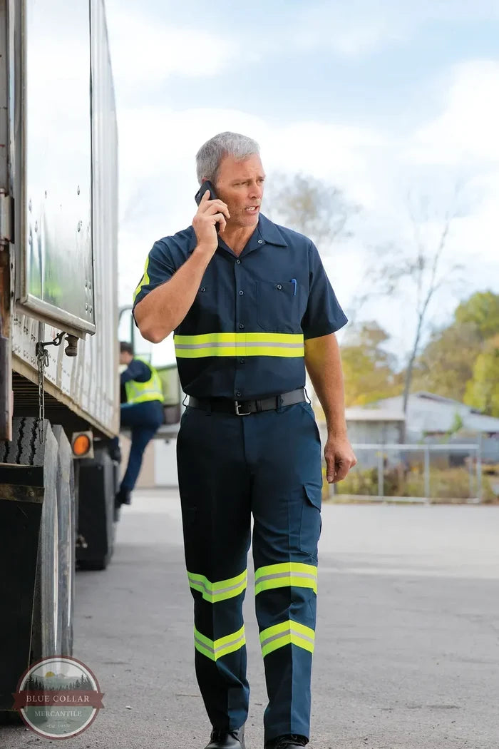 Red Kap PT88EN Men's Enhanced Visibility Industrial Cargo Pant in Navy with Hi-vis Stripe shown with matching shirt