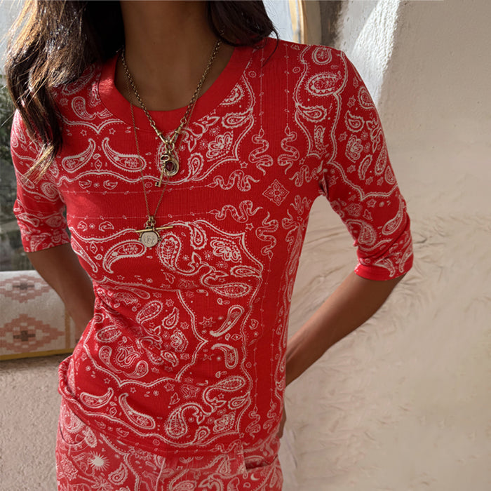 Red Bandana Rib Jersey Top with 3/4 sleeves and white paisley print, styled with layered gold necklaces.